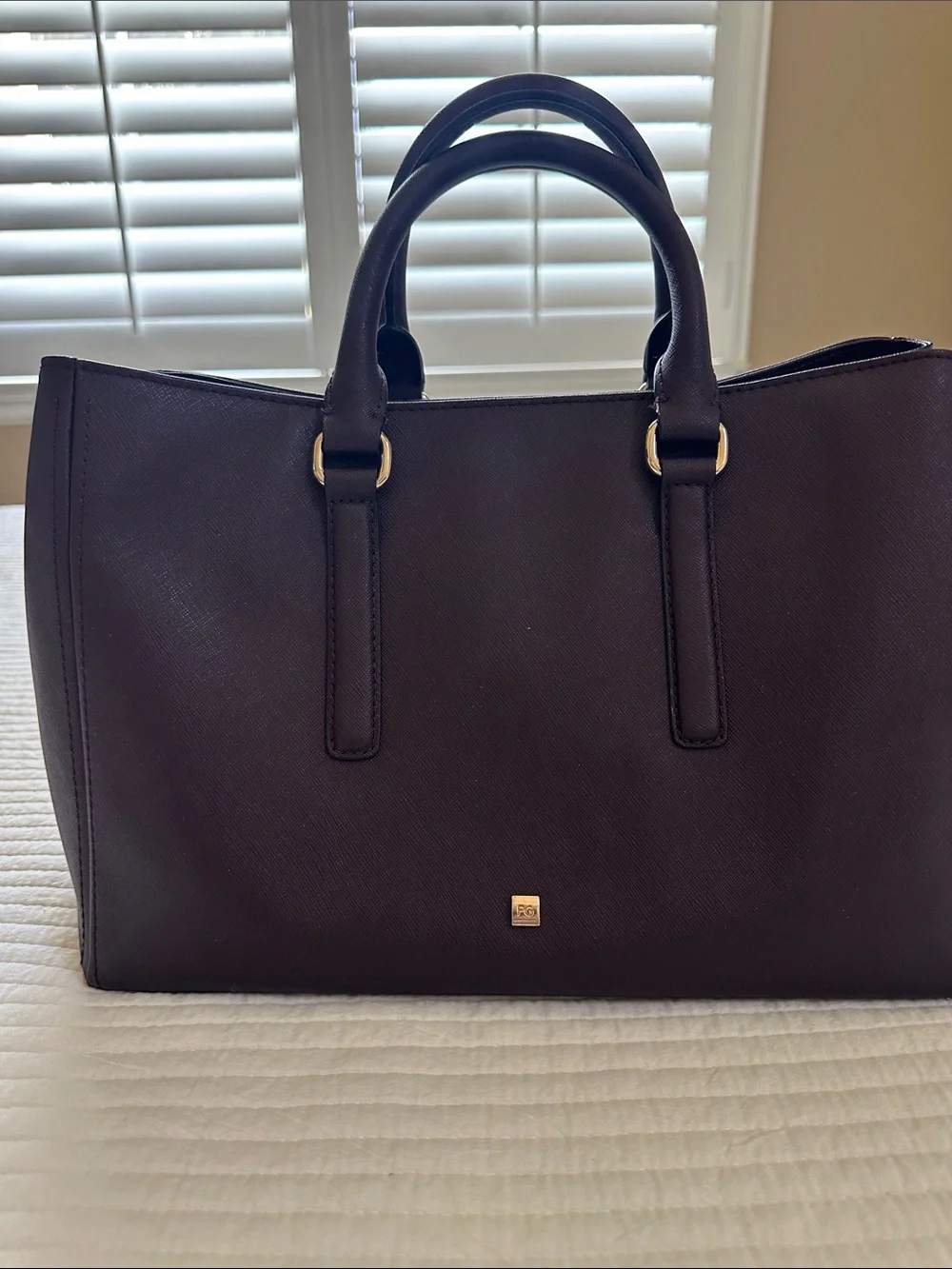 Beautiful Purificacion Garcia, Spanish brand. Structured maroon leather handbag.